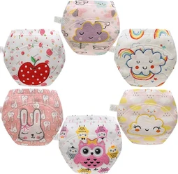 Set van 6 oefenbroekjes met roze prints en borduursels Zes oefenbroekjes met roze prints van appel, wolken, regenbogen, konijn en uilen op witte achtergrond