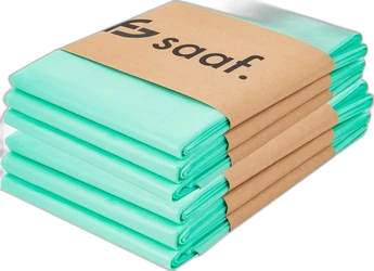 Stapeltje van zes turquoise Saaf navullingen met bruine papieren band en zwart logo