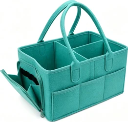 Turquoise vilten luiertafel-organizer met vakken Turquoise vilten luiertafel-organizer met handvatten, binnenvakken, voorvakken en open zijvak met rits