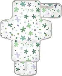 Draagbare verschoningsmat met groene bloemetjes Uitgevouwen draagbare verschoningsmat met groene bloemprint, grijze rand en opbergvakjes