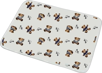 Licht aankleedkussen met afgeronde hoeken en herhalende teddyberenprint op zwarte achtergrond