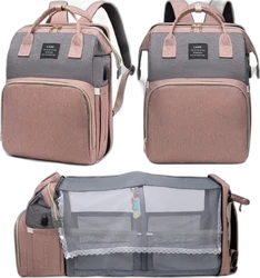Grijs oudroze luiertas rugzak met uitklapbaar bedje Grijs oudroze luiertas rugzak met goudkleurige ritsen, USB-poort en uitgeklapt babybedje met mesh.