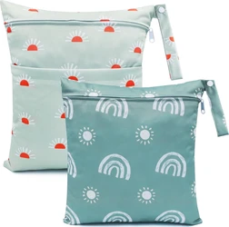 m-winkel wetbag set van 2 in mintgroen met zonnen en regenbogen Set van twee mintgroene wetbags met rits en handlus motief zonnen en regenbogen