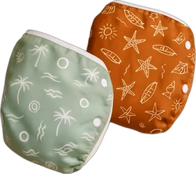 Set van twee herbruikbare luiers met tropical motief groen met palmbomen en oranje met zeesterren