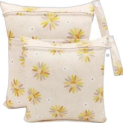 Twee beige waterdichte wetbags met geel bloemmotief en ritssluiting en draaglus