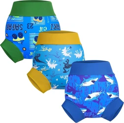 Drie blauwe zwemluiers in een set met groene boord safariprint gele boord dinosaurusprint en blauwe boord haaienprint