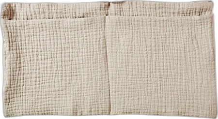 Hangende babybedorganizer mousseline met strikbanden beige Beige mousseline hangende babybedorganizer met twee ruime vakken en zachte textuur