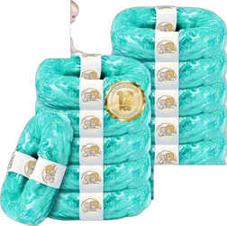 Stapel turquoise luiertas vullingen met witte labels en gouden 12 pcs badge op zwarte achtergrond